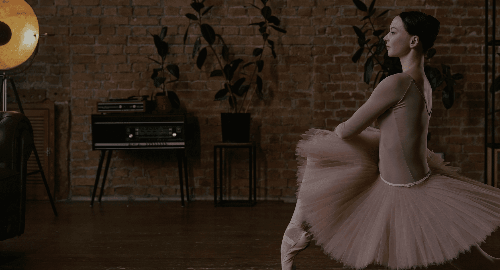 Ballet dancer performing in a pink tutu
